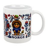 The Nordic Wholesalers Mug: Norge Norway Rosemaling Troll Wraparound Ceramic Mug (11 oz) features a troll in a blue sweater, Norwegian flags, houses, flowers, folk art designs, and "NORGE" below—a charming Norway collectible.