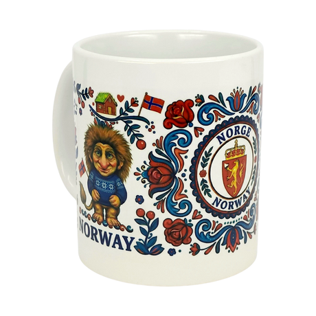 The Nordic Wholesale Mug: Norge Norway Rosemaling Troll Wraparound Ceramic Mug (11 oz) features a troll in a blue sweater, red and blue floral patterns, a house, Norwegian flag, and a "Norge Norway" crest.