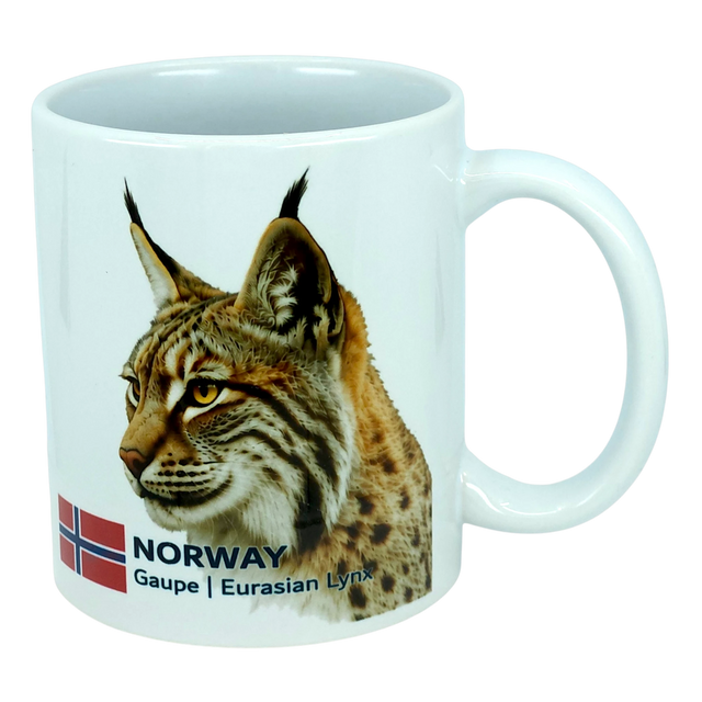 Enjoy your favorite beverage with the Mug: Norway National Animal Eurasian Lynx Ceramic Mug (11 oz) by Nordic Wholesale. This white ceramic mug features a detailed illustration of the Eurasian lynx, complete with tufted ears and a spotted coat, alongside the Norwegian flag and the text “NORWAY Gaupe | Eurasian Lynx." An ideal tribute to Norway's natural heritage, this mug is perfect for anyone who loves Norwegian wildlife.
