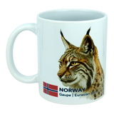 Introducing the Nordic Wholesale Mug: Norway National Animal Eurasian Lynx Ceramic Mug (11 oz)—a white ceramic mug showcasing an illustrated Eurasian lynx, Norway’s flag, and the text “NORWAY Gaupe | Eurasian Lynx” on the side. This mug is a perfect tribute to Norwegian wildlife and Nordic culture.