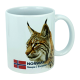 The Mug: Norway National Animal Eurasian Lynx Ceramic Mug (11 oz) by Nordic Wholesale is a white mug featuring the head of a Eurasian lynx, the Norwegian flag, and the text "NORWAY Gaupe | Eurasian Lynx"—a unique ceramic mug celebrating Norwegian wildlife and Nordic culture.