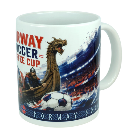 Celebrate your love for soccer and Norwegian heritage with the Norway Soccer Coffee Cup Mug – Viking Longship Fan Mug from Nordic Wholesale. This white mug showcases a detailed Viking ship, a Viking, and a soccer ball sailing on water, with a vibrant stadium and lively crowd in the background. The text “Norway Soccer Coffee Cup” is displayed above decorative Norwegian patterns at the base, making this unique Viking coffee cup an ideal gift for fans or a standout addition to any Norwegian collection.