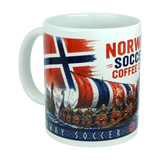 Introducing the Norway Soccer Coffee Cup Mug – Viking Longship Fan Mug by Nordic Wholesale, a white mug adorned with a Norwegian flag, Viking ships with shields and warriors, and the bold red and blue text "Norway Soccer Coffee Club." This eye-catching Norway soccer mug makes an ideal Norwegian gift or Viking coffee cup for fans passionate about both football and Nordic heritage.