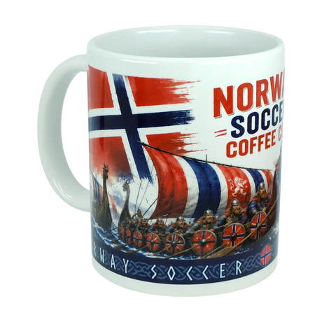 Introducing the Norway Soccer Coffee Cup Mug – Viking Longship Fan Mug by Nordic Wholesale, a white mug adorned with a Norwegian flag, Viking ships with shields and warriors, and the bold red and blue text "Norway Soccer Coffee Club." This eye-catching Norway soccer mug makes an ideal Norwegian gift or Viking coffee cup for fans passionate about both football and Nordic heritage.