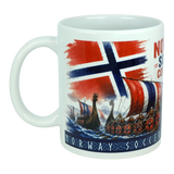 Enjoy your morning coffee with the Norway Soccer Coffee Cup Mug – Viking Longship Fan Mug by Nordic Wholesale. This white mug showcases a striking Norwegian flag and Viking longships with shields sailing on the water, with “Norway Soccer” printed along the bottom. The perfect gift for fans of Norwegian soccer or anyone who appreciates a classic Viking-themed coffee cup design.