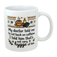 The Swedish Gift Store's 11 oz "Not Very Hygge" Coffee Mug features Nordic patterns and text: My doctor told me to cut back on caffeine. I told him that's not very Scandinavian humor—or hygge coffee mug—of him.