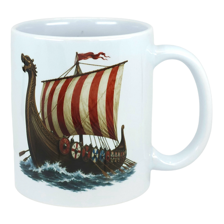 Ceramic mug with a Viking longship design, showing the ship sailing on waves, a striped sail, and round shields along the side.