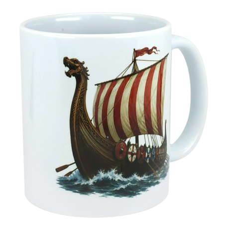 Ceramic mug featuring a Viking longship with a dragon head prow, red and white sail, side shields, and waves depicted below the ship.