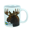 Start your day with a touch of Nordic nature using the Mug: Sweden Älg Moose Ceramic Mug (11 oz) from Nordic Wholesale. Featuring a photo of a moose, the Swedish flag, and the text “SWEDEN Älg | Moose” on a plain white background, this stylish ceramic mug is a charming addition to any Scandinavian kitchen.