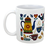 The Mug: Swedish Fika Traditions Wraparound Ceramic Mug (11 oz) from Swedish Gift Store features cheerful folk art—yellow teapot, patterned cups, flowers, bird, heart, and cookies—perfect for enjoying your Nordic fika moments.