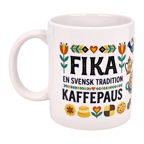 The Nordic Wholesale 11oz ceramic mug features “Fika — En Svensk Tradition Kaffepaus” and colorful floral Swedish pastry designs—an ideal Scandinavian gift celebrating the tradition of fika.