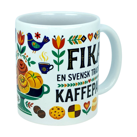 Enjoy your daily coffee ritual with the Mug: Fika — "En Svensk Tradition Kaffepaus" Swedish Fika Traditions Wraparound Ceramic Mug (11 oz) by Nordic Wholesale, featuring vibrant Scandinavian folk art with pastries, a blue bird, flowers, and the phrase "Fika En Svensk Tradition Kaffe Paus." This charming mug is the perfect gift for anyone who appreciates the cozy Swedish tradition of fika.