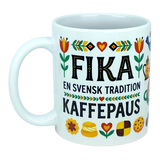 The Nordic Wholesale Mug: Fika — "En Svensk Tradition Kaffepaus" Swedish Fika Traditions Wraparound Ceramic Mug (11 oz) features vibrant flower and heart motifs, with the phrase FIKA EN SVENSK TRADITION KAFFEPAUS. Adorned with images of pastries and cookies along the bottom, this charming Scandinavian mug is an ideal Swedish tradition gift for fika enthusiasts.