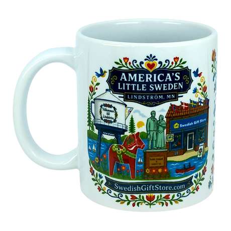 Enjoy your favorite beverage in the Mug: Swedish Gift Store America's Little Sweden Ceramic Mug (11 oz) by Nordic Wholesale. This charming white ceramic mug features colorful illustrations of Lindström, MN landmarks—including a water tower, statues, a Swedish Gift Store, a Dala horse, and classic Scandinavian designs. The text “America’s Little Sweden Lindström, MN” highlights the town’s heritage, making this Swedish-American mug the perfect gift for anyone who loves local culture or Nordic traditions.