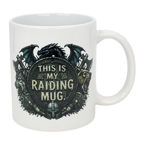 The Nordic Wholesale Mug: This Is My Raiding Mug Viking Ceramic Mug (11 oz) is a white ceramic mug with a dragon, wolf, and bear around a shield reading "This Is My Raiding Mug," surrounded by Norse and Viking-style designs.