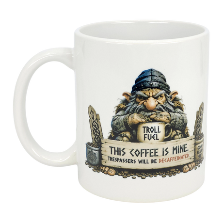 The Nordic Wholesale Mug: Troll Fuel Ceramic Coffee Mug (11 oz) features a grumpy troll with a "Troll Fuel" cup and the warning, "This coffee is mine. Trespassers will be decaffeinated," plus decorative Scandinavian borders.