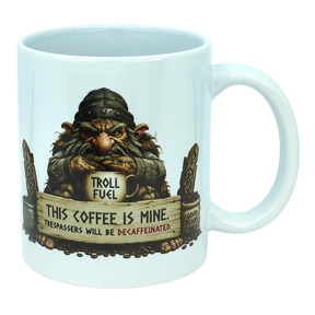 The Mug: Troll Fuel Ceramic Coffee Mug (11 oz Capacity) by Nordic Wholesale is a white ceramic mug featuring a grumpy troll inspired by Nordic folklore, holding a cup labeled "Troll Fuel" with the warning: "This coffee is mine. Trespassers will be decaffeinated." Decorative accents and coffee beans surround the troll, making this Scandinavian-themed mug both whimsical and bold.