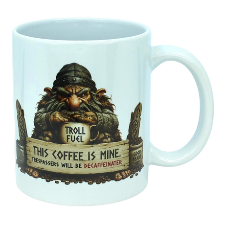 The Mug: Troll Fuel Ceramic Coffee Mug (11 oz Capacity) by Nordic Wholesale is a white ceramic mug featuring a grumpy troll inspired by Nordic folklore, holding a cup labeled "Troll Fuel" with the warning: "This coffee is mine. Trespassers will be decaffeinated." Decorative accents and coffee beans surround the troll, making this Scandinavian-themed mug both whimsical and bold.