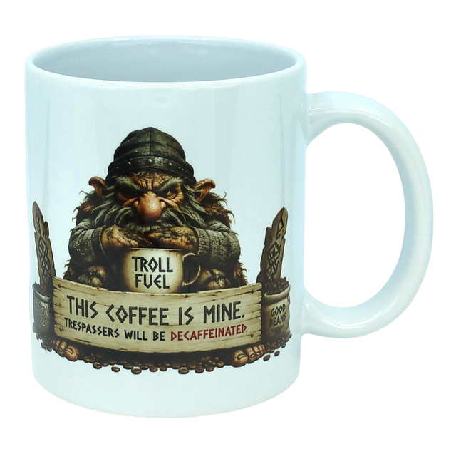 The Mug: Troll Fuel Ceramic Coffee Mug (11 oz Capacity) by Nordic Wholesale is a white ceramic mug featuring a grumpy troll inspired by Nordic folklore, holding a cup labeled "Troll Fuel" with the warning: "This coffee is mine. Trespassers will be decaffeinated." Decorative accents and coffee beans surround the troll, making this Scandinavian-themed mug both whimsical and bold.