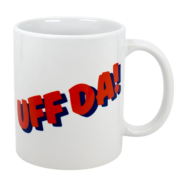 The Swedish Gift Store’s Classic "Uff Da!" Ceramic Mug (11 oz) features bold red and blue 3D lettering, making it a stylish white Scandinavian coffee cup to showcase your Nordic spirit.