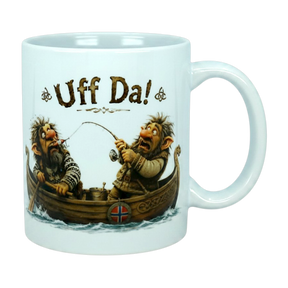 The Mug: Uff Da Fishing Trolls Ceramic Mug (11 oz Capacity) from Nordic Wholesale features two cartoon trolls in a Viking boat—one fishing while the other reacts in surprise—with "Uff Da!" printed above them, capturing classic Scandinavian humor.