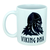 Introducing the Nordic Wholesale Mug: Viking DNA White Ceramic Mug with Historically Accurate Helmet (11 oz)—a white Scandinavian ceramic mug adorned with a bold black graphic of a bearded Viking wearing an authentic-style helmet, and "VIKING DNA" printed beneath the illustration. The perfect coffee mug for anyone proud of their Nordic heritage!.