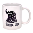 Show your Norse pride with the Swedish Gift Store’s Mug: Viking DNA White Ceramic Mug (11 oz), featuring a striking black Viking helmet and beard graphic with "VIKING DNA" text—ideal for fans of Scandinavian heritage.