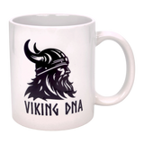 Show your Norse pride with the Swedish Gift Store’s Mug: Viking DNA White Ceramic Mug (11 oz), featuring a striking black Viking helmet and beard graphic with "VIKING DNA" text—ideal for fans of Scandinavian heritage.