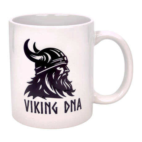 The Mug: Viking DNA White Ceramic Mug (11 oz) by Nordic Wholesale showcases a black Viking warrior illustration with "VIKING DNA" text—ideal for anyone proud of their Scandinavian or Norse heritage.