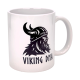 The Swedish Gift Store’s 11 oz Viking DNA White Ceramic Mug features a bold black Viking illustration with horned helmet and beard, plus VIKING DNA text—perfect for honoring your Norse roots with each sip.
