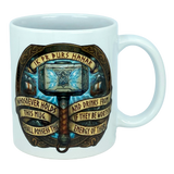 The Mug: Viking Energy of Thor Ceramic Mug (11 oz) by Nordic Wholesale is a white mug showcasing Thor’s hammer with intricate Norse designs and the inscription: “Whosoever holds this mug and drinks from it, if they be worthy, shall possess the energy of Thor.”.