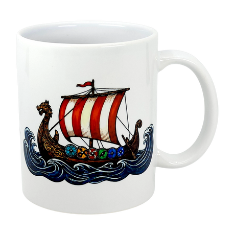 The Mug: Viking Longship Ceramic Mug (11 oz) by Swedish Gift Store features a white ceramic design with a Norse longship, dragon-shaped prow, red and white sail, colorful shields, and blue waves.