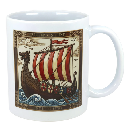 White ceramic mug featuring a Viking ship with striped sails, shields, dragon head prow, runic text above or below the ship, and patterned decorative borders.