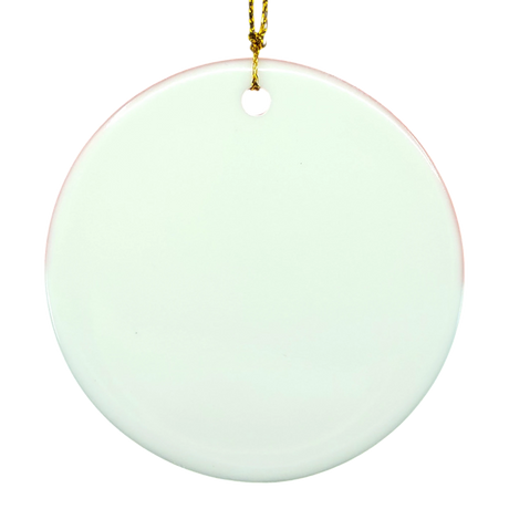 Round white ceramic ornament with a small hole at the top, suspended by a thin gold string, in front of a white background. Nordic folk art inspiration.