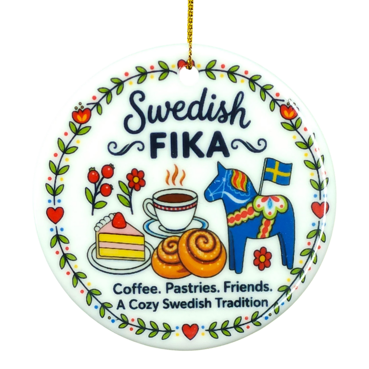 Round ceramic ornament featuring Swedish FIKA text, illustrations of coffee, cake, cinnamon buns, flowers, a Dala horse, and a Swedish flag.