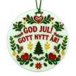 Round Scandinavian ceramic ornament featuring GOD JUL! GOTT NYTT ÅR! text surrounded by traditional floral, heart, and evergreen tree illustrations.