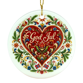 Ceramic Nordic ornament with a red heart, floral accents, “God Jul” at the center, and two small Norwegian flags below in traditional folk art style.