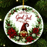 Round Scandinavian ornament featuring “God Jul,” a gnome holding a heart, and a border of red flowers with greenery, shown hanging on a Christmas tree.