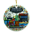 Round ornament featuring a water tower, Dala horse, store, and floral patterns. “SwedishGiftStore.com” is printed on the design.