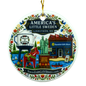 Round ornament featuring a water tower, Dala horse, store, and floral patterns. “SwedishGiftStore.com” is printed on the design.