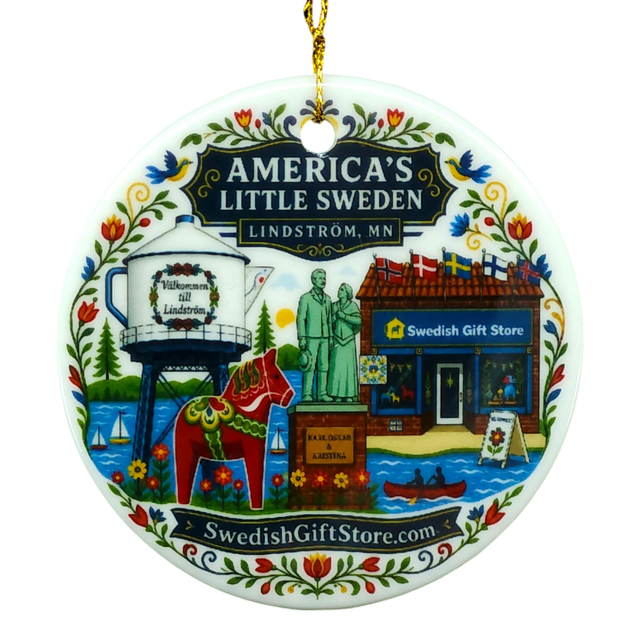 Round ornament featuring a water tower, Dala horse, store, and floral patterns. “SwedishGiftStore.com” is printed on the design.