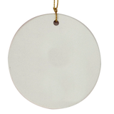 A round, flat, white ceramic Viking Ship Ornament (2.875" diameter) by Nordic Wholesale, featuring a small hole at the top threaded with a gold string and displayed against a plain white background.