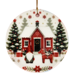Bring Nordic charm to your holiday décor with the Ornament: Winter Cottage with Tomte and Dala Horse Ceramic Ornament from Nordic Wholesale. This round ceramic keepsake features a red house, Christmas trees, a cheerful gnome, a festive red Dala horse, presents, and delicate snowflakes on a white background adorned with vibrant red and green accents. Complete with a gold string for easy hanging, it’s the perfect Swedish Christmas decoration for adding Scandinavian style to your festivities.