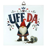 Square Scandinavian wall plaque featuring a ceramic tomte gnome in a red cap, the text UFF DA above a spilled mug, and folk-art patterns.
