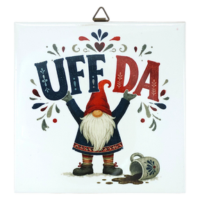 Square Scandinavian wall plaque featuring a ceramic tomte gnome in a red cap, the text UFF DA above a spilled mug, and folk-art patterns.