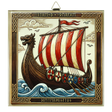 Ceramic tile showing a stylized Viking longship with a dragon head prow, red-and-white sails, visible runes, shields along the side, and waves beneath.