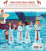Four girls in white robes and wreaths with candles on their heads walk in the snow, holding candles, followed by a boy with treats—a scene that feels straight out of Book: Christmas Wish for Little Dala Horse.