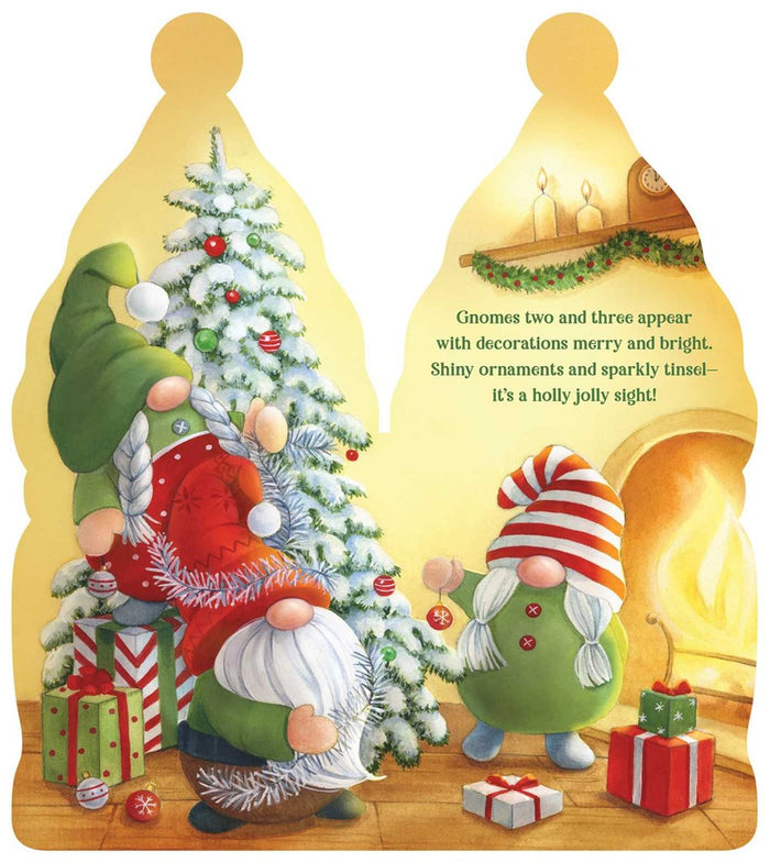 Christmas Gnomes Gnome Shaped Board Book by Kelly Green features festive gnomes, a white tree with ornaments, gifts, and a cozy fireplace—perfect for bringing holiday charm to children's storytime. Fuzzy beard on cover adds extra fun!.