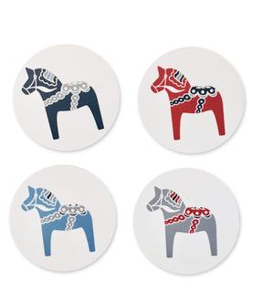 A pack of four coasters, showcasing stylized Dala horse designs in blue, red, and gray on white backgrounds, crafted in Sweden.