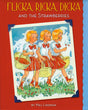 Book cover illustration for "Flicka, Ricka, Dicka and the Strawberries" by Maj Lindman, showing three identical blonde girls in red skirts and white blouses carrying baskets after picking strawberries.